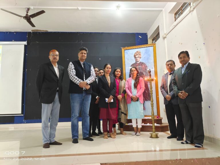 Participants lighting a ceremonial lamp during an ISM Ranchi campus event