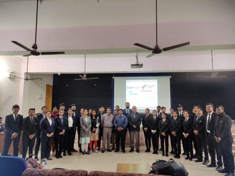 A group of participants gathered on stage during an ISM Ranchi campus event