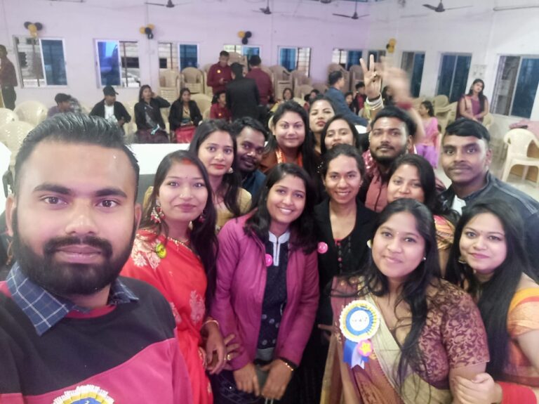 Students smiling for a group photograph at an ISM Ranchi celebration
