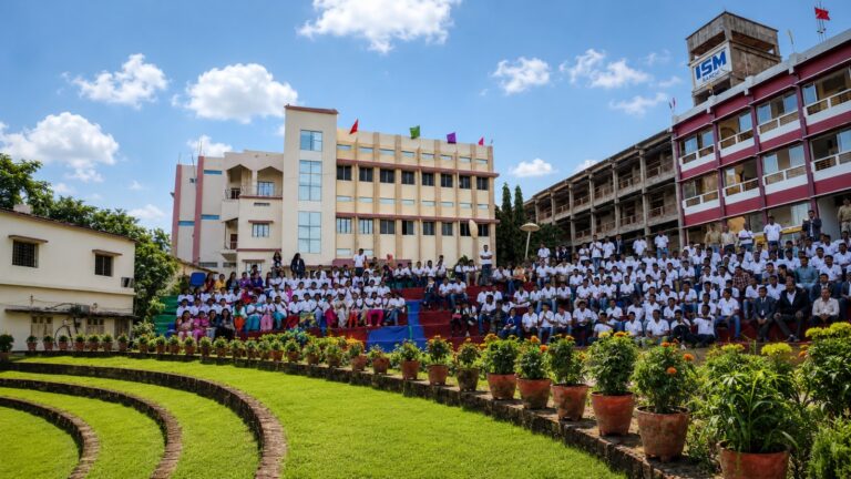 People gathered in the courtyard between ISM Ranchi campus buildings
