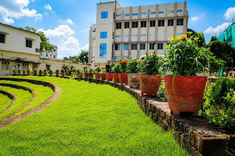 An ISM Ranchi academic building overlooking landscaped campus gardens