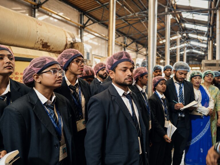 ISM Ranchi students observing equipment during a visit to an industrial facility