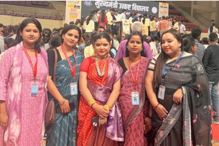 A group of students gathered in colourful attire at an ISM Ranchi celebration
