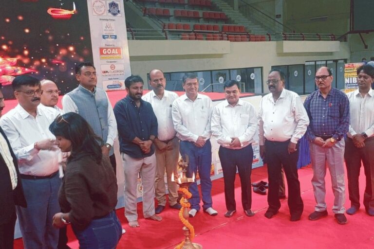 Guests standing together at an outdoor ISM Ranchi campus gathering